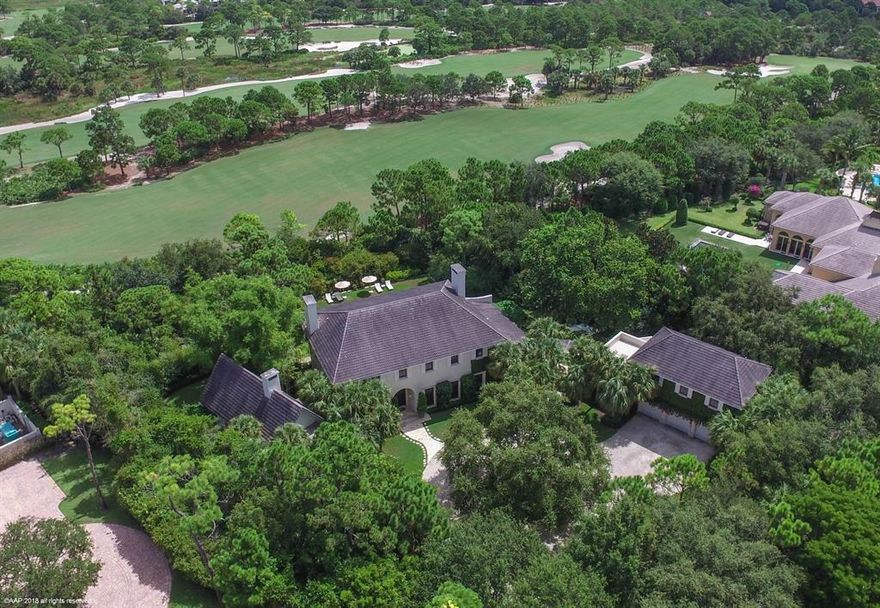 Extraordinary custom built estate within The Bears Club.  This three home compound is sited on 1.32 acres along the 15th fairway of the Nicklaus Signature course at The Bears Club.  Luxurious interior spaces and loggias profligately detailed at the highest taste level. Interior Design by Albert Hadley. Landscape architecture by Sanchez & Maddux, Palm Beach.