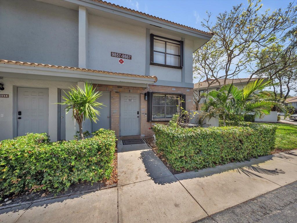 Photo of 9867 Riverside Drive, Coral Springs, FL 33071 (MLS # B26030175)