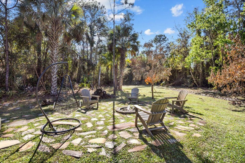 Photo of 1918 SW Crane Creek Avenue, Palm City, FL 34990 (MLS # R11166561)