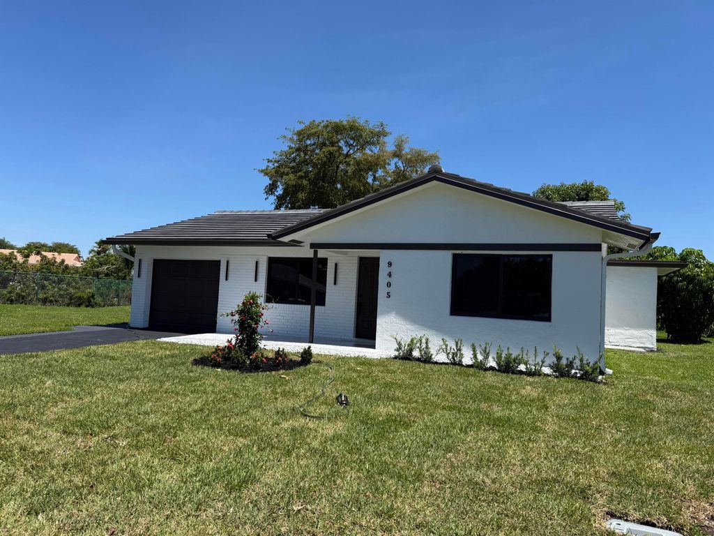 Photo of 9405 NW 74th Street, Tamarac, FL 33321 (MLS # B26026561)