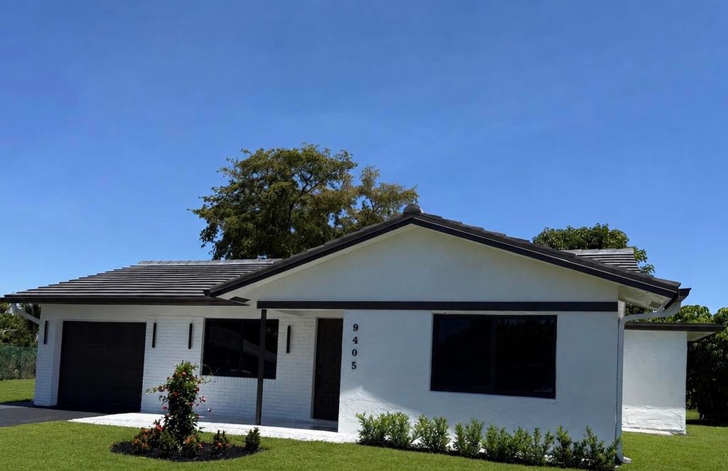 Photo of 9405 NW 74th Street, Tamarac, FL 33321 (MLS # B26026561)
