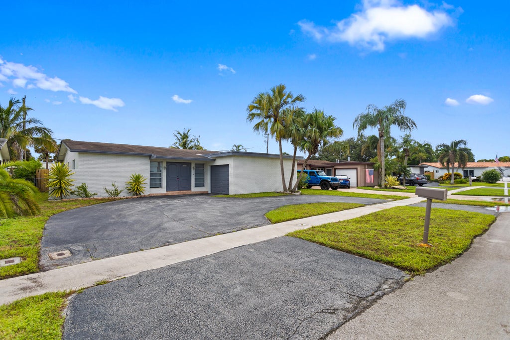 Photo of 2000 NW 91ST Way, Sunrise, FL 33322 (MLS # B26079410)