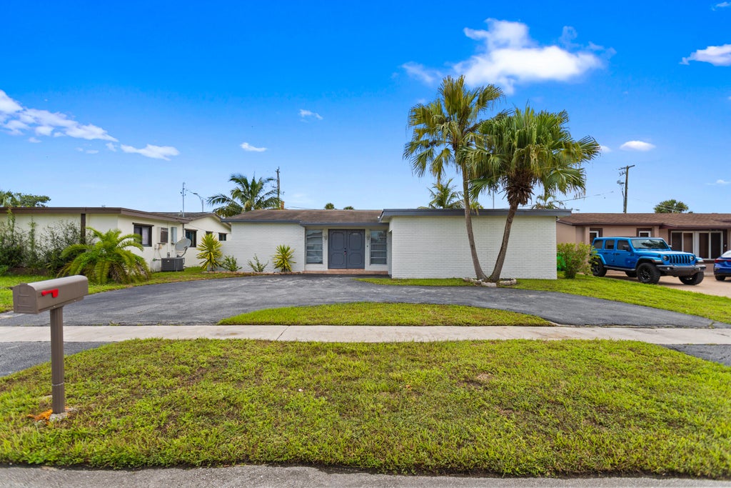 Photo of 2000 NW 91ST Way, Sunrise, FL 33322 (MLS # B26079410)