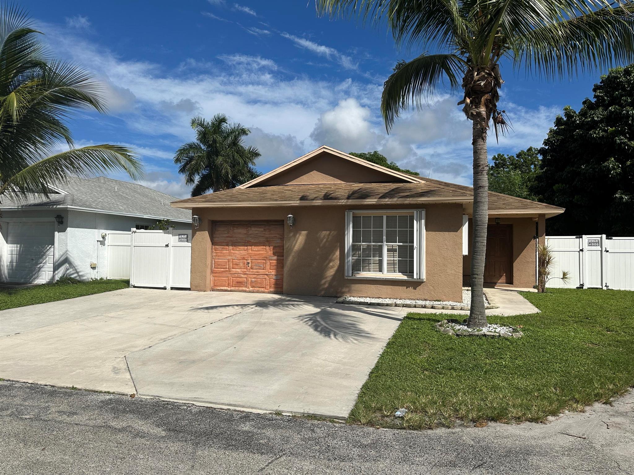 Beautiful 2 bedroom, 2 bathroom home in The Courts at Boynton Place. Open floor plan with lots of light, laminate and tile flooring, walk in closet, Great Room, patio in the backyard with a pergola, fenced back yard, ceiling fans, breakfast bar, and lots of counter space. This won't last long! Must see! All residents are enrolled in the Resident Benefits Package (RBP) for $35.00/month which includes HVAC air filter delivery (for applicable properties), credit building to help boost your credit score with timely rent payments, $1M Identity Protection, move-in concierge service making utility connection and home service setup a breeze during your move-in, our best-in-class resident rewards program, and much more! More details upon application.