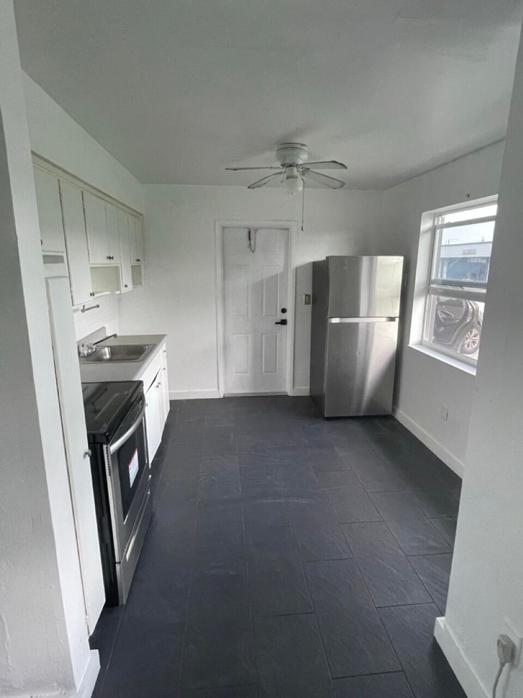 Photo of 391 NE 42nd Court #North, Oakland Park, FL 33334 (MLS # B26017789)