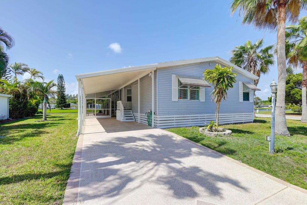 Photo of 79 W Caribbean, Port Saint Lucie, FL 34952 (MLS # R10974790)