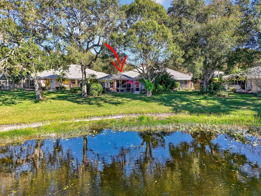 Rare remodeled ''Extended Capri'' model on the lake with a pool. Prime location at the end of the lake with long lake views. Just steps to the community tennis & pickleball courts and community pool. Remodeled kitchen & bathrooms featuring Custom countertops and stainless-steel appliances. Light & bright with glimmering white tile floors and vaulted ceilings. Screened & heater pool with panoramic lake views. Roof replaced in 2014 and accordion hurricane shutters on the sliding doors. 24 hour manned and gated community with majestic old oak trees lining the streets.