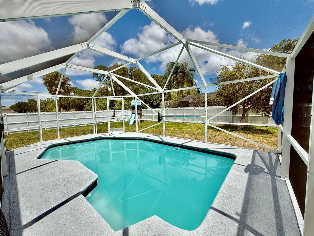 Photo of 1757 SW Gemini Lane, Port Saint Lucie, FL 34984 (MLS # R11085218)