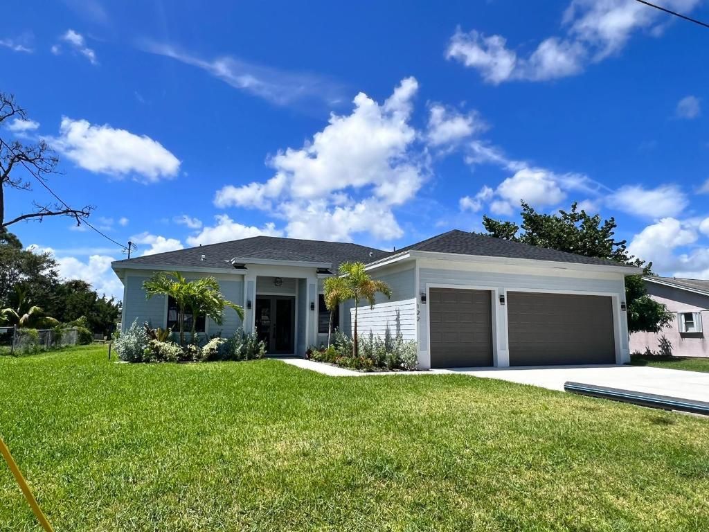 Photo of 122 NW Dorchester Street, Port Saint Lucie, FL 34983 (MLS # R11077350)