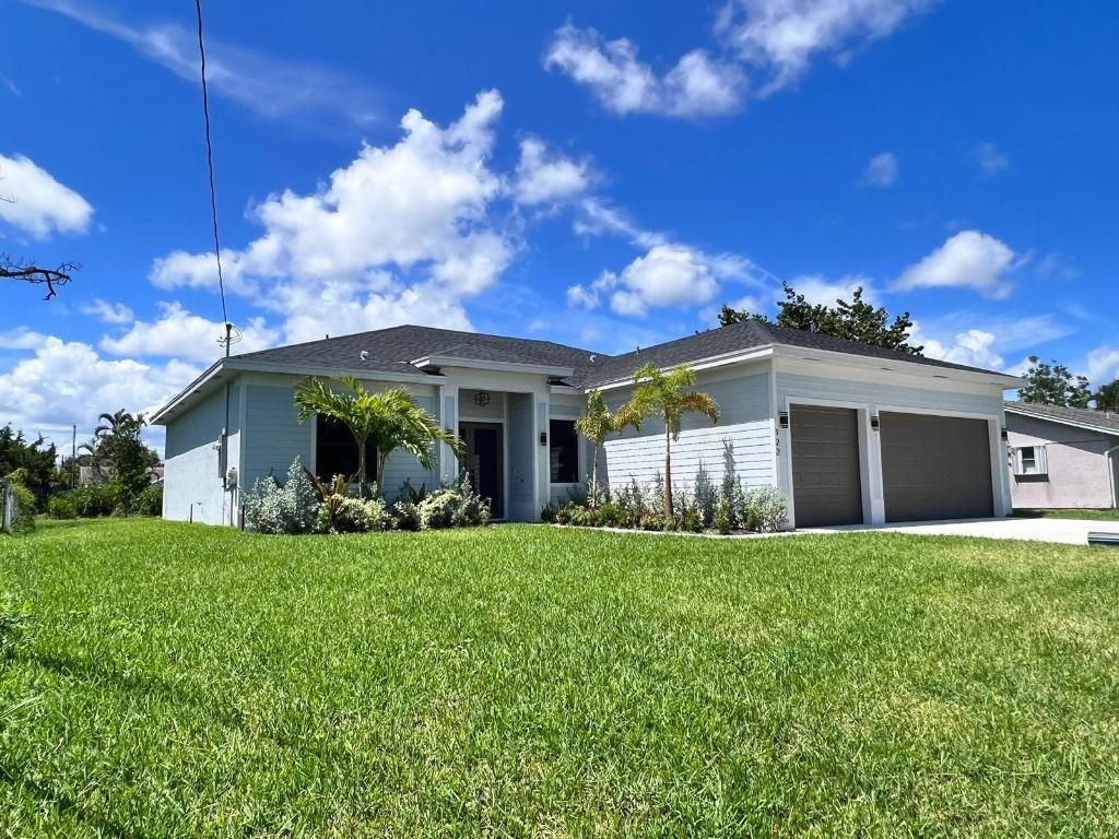 Photo of 122 NW Dorchester Street, Port Saint Lucie, FL 34983 (MLS # R11077350)