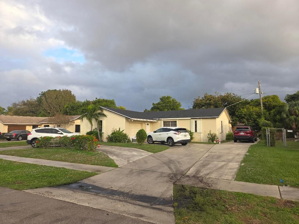 Photo of 1474 N Mangonia Circle, West Palm Beach, FL 33401 (MLS # R11148094)