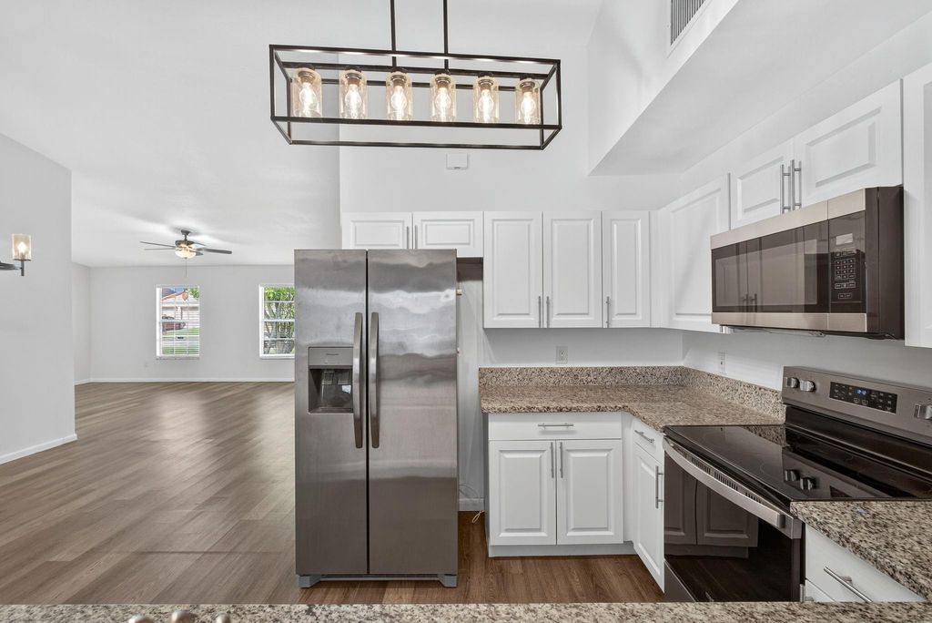 Photo of 5058 Canal Circle, Lake Worth, FL 33467 (MLS # F10519608)