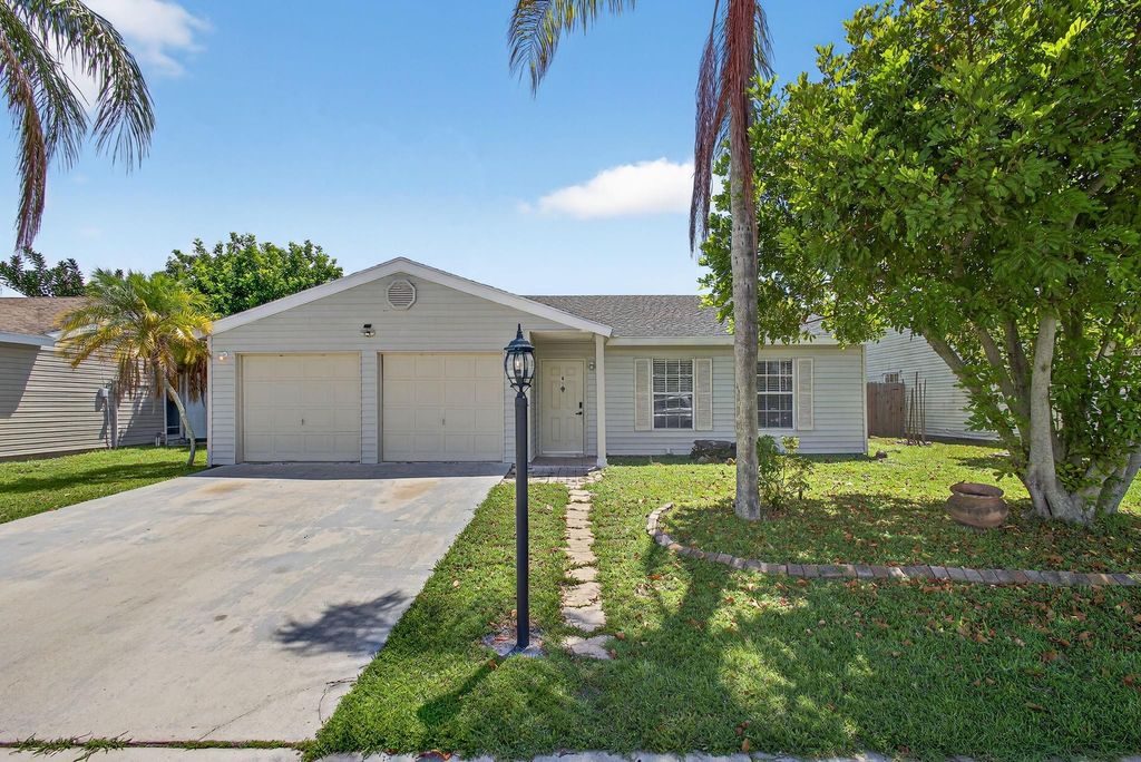 Photo of 5058 Canal Circle, Lake Worth, FL 33467 (MLS # F10519608)