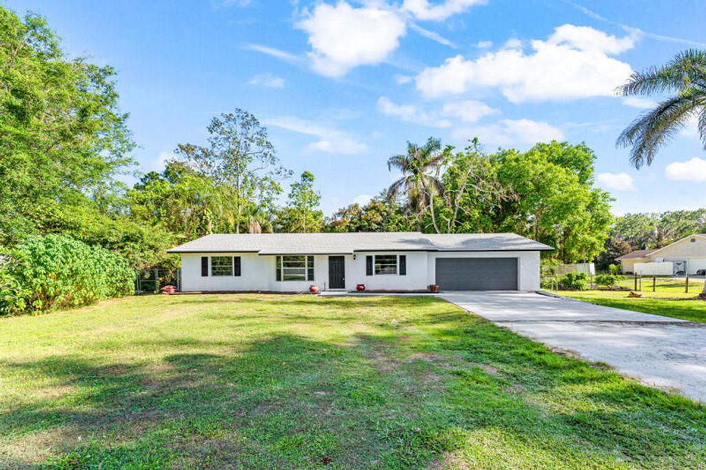 Photo of 11852 N 47th Rd Road N, The Acreage, FL 33411 (MLS # B26027135)
