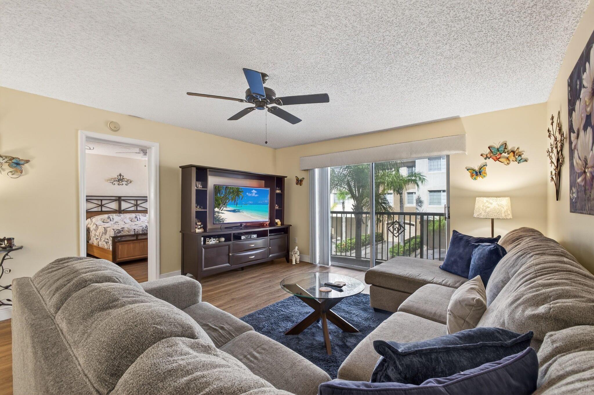 Enjoy this immaculate two bedroom two bath one car garage home. Well kept light and bright unit with a patio. HOA is ONLY 397.00 Includes Exterior Insurance Metal Roofs install in 2019 and Air Conditioner and Hot Water is New as 2024 and 2025. There's a community center with a resort like Pool, basketball courts and tennis.