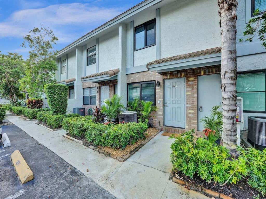 Photo of 9845 RIVERSIDE Drive #8-28, Coral Springs, FL 33071 (MLS # B26058039)