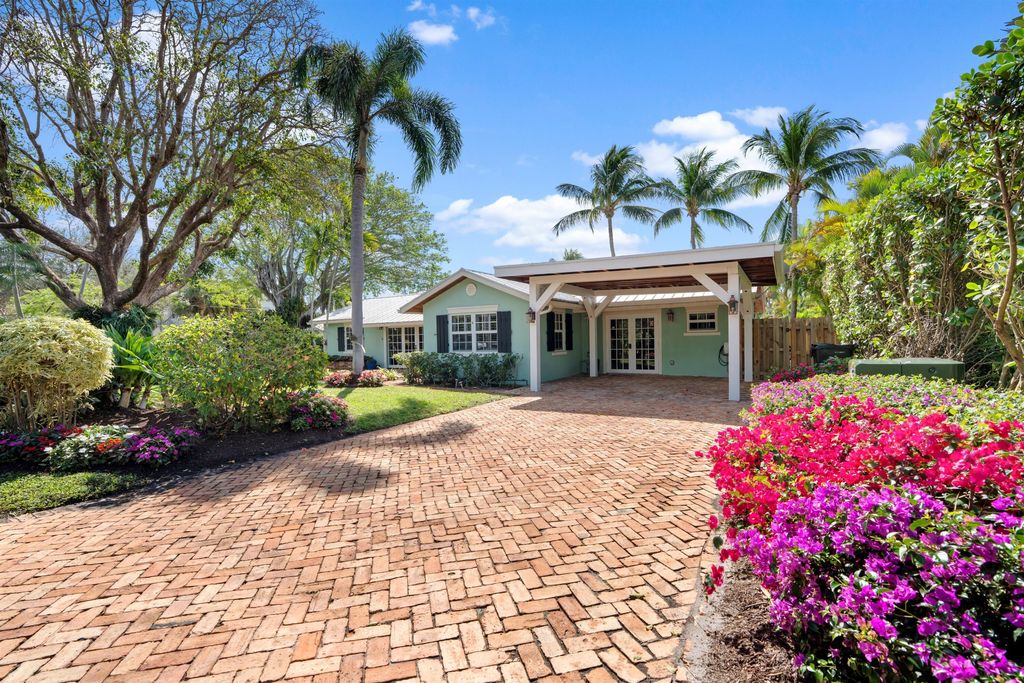 Photo of 402 Lake Dr, Delray Beach, FL 33444 (MLS # B26000608)