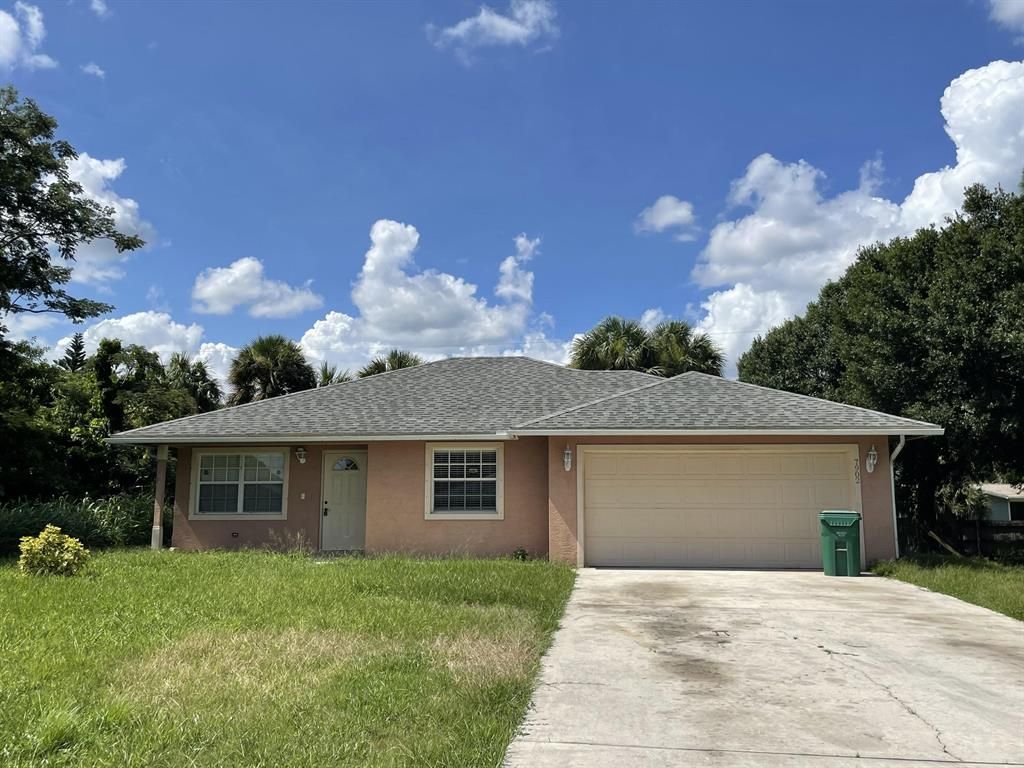 Photo of 7902 Pacific Avenue, Fort Pierce, FL 34951 (MLS # R10735630)