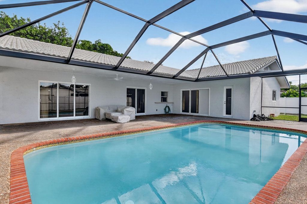 Photo of 1544 NW 9th Street, Boca Raton, FL 33486 (MLS # R11126860)