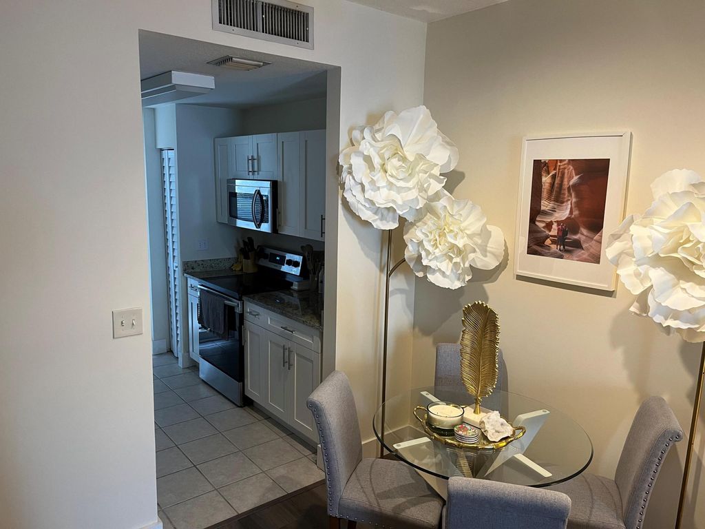 Photo of 1152 University Boulevard #12, Jupiter, FL 33458 (MLS # R10914539)