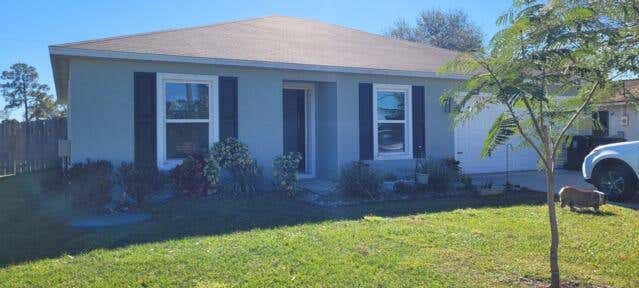 Photo of 574 NW Archer Avenue #574, Port Saint Lucie, FL 34983 (MLS # B26037820)