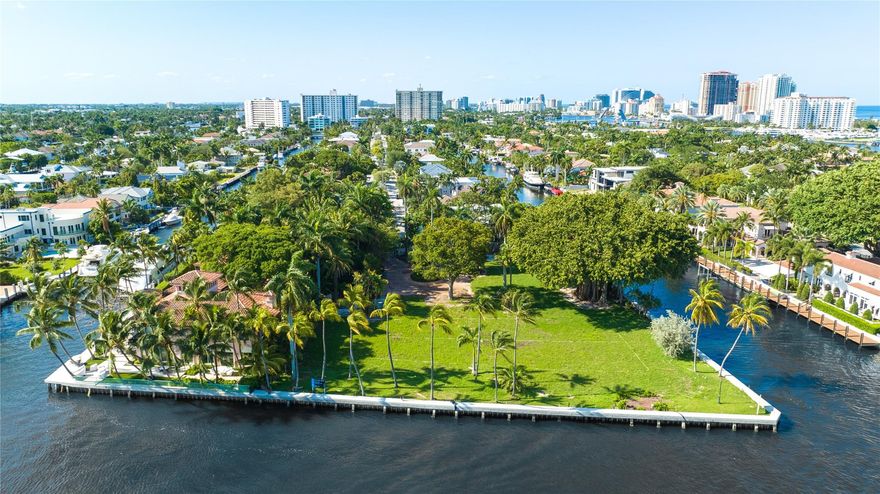 NEWLY UPDATED PRICE REDUCTION!! Discover the crown jewel of Fort Lauderdale in the esteemed Idlewyld/Riviera Isles! Once owned by the Anheuser-Busch family, this 1.2-acre estate is a RARE INVESTMENT GEM! Offering 520+ ft of water frontage (217x303) in a PEACEFUL Intracoastal no-wake zone, it's perfect for YOUR MEGA YACHT! IMAGINE building a MASSIVE MANSION with a multi-car garage and ALL YOUR DREAM AMENITIES! Boasting stunning ocean views from the third story and just 5 mins from the 17th St Causeway. This is one of the LAST BUILDABLE POINT LOTS in the city! Opportunities for such a uniquely large lot in SE Fort Lauderdale are infrequent, showcasing the RARE nature of this offering!!AN UNMATCHED OPPORTUNITY!!!