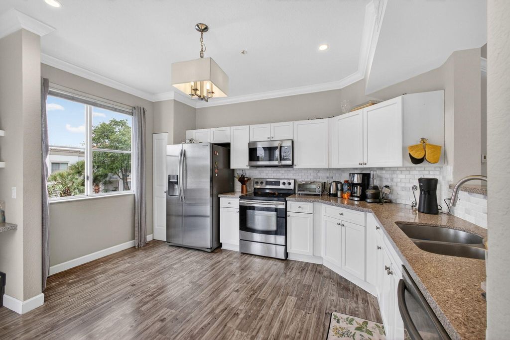 Photo of 11028 Legacy Drive #302, Palm Beach Gardens, FL 33410 (MLS # B26001969)