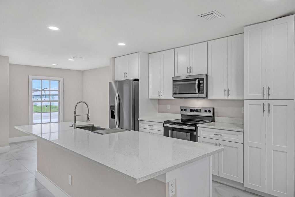 Photo of 4602 SW Savona Boulevard, Port Saint Lucie, FL 34953 (MLS # R11120243)