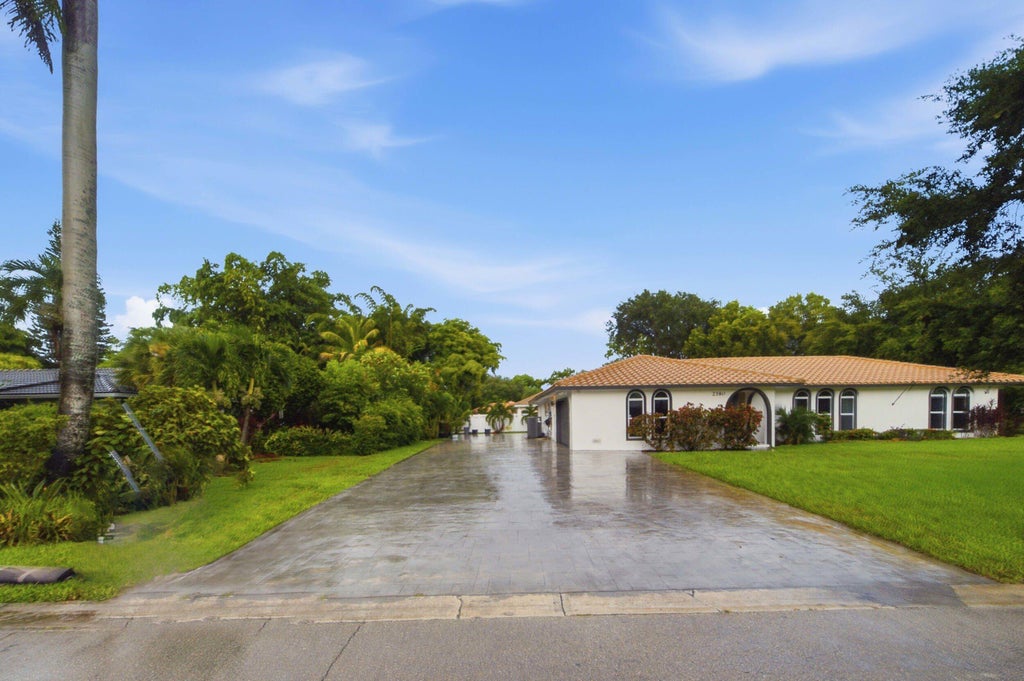 Photo of 2380 NW 107TH Avenue, Coral Springs, FL 33065 (MLS # B26072596)