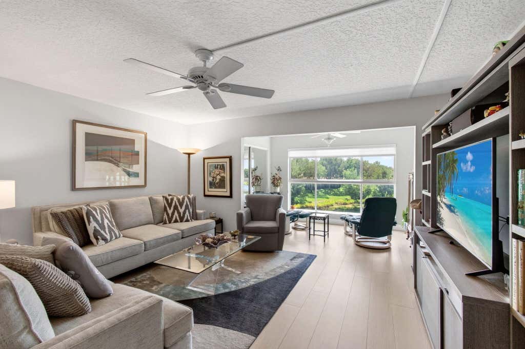 Photo of 5746 CRYSTAL SHORES Drive #303, Boynton Beach, FL 33437 (MLS # B26064169)