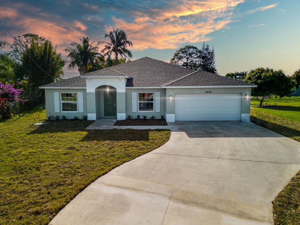 Photo of 2452 SE Bordeaux Court, Port Saint Lucie, FL 34952 (MLS # R10855891)