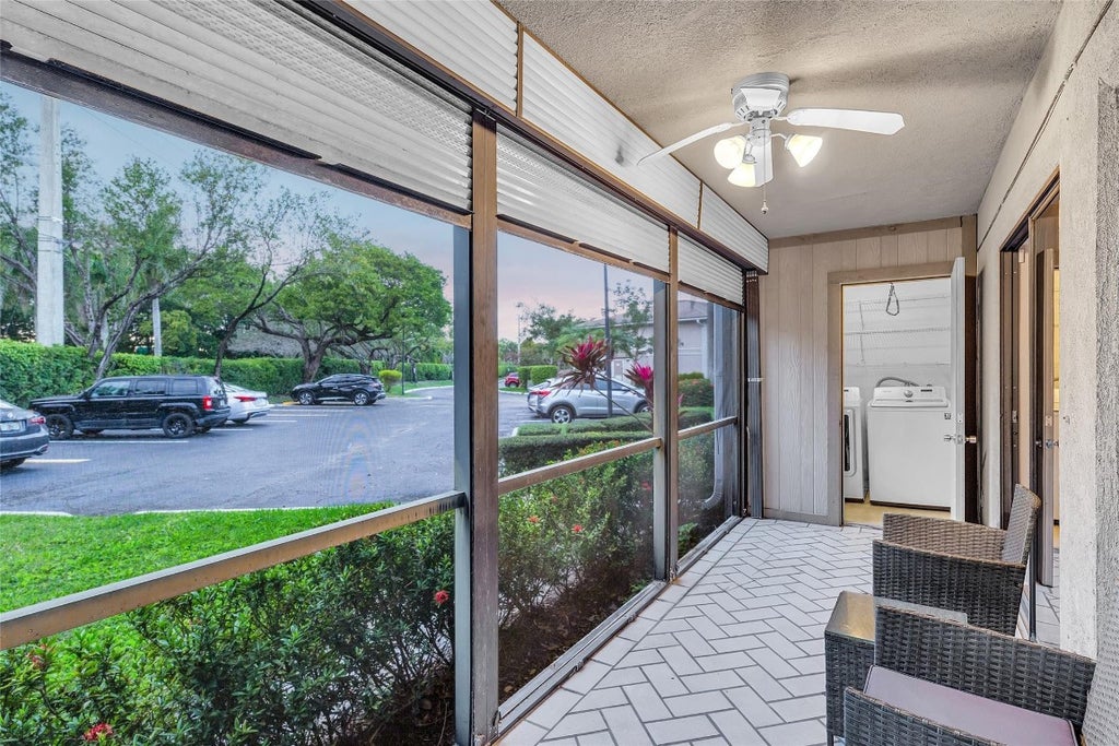 Photo of 10895 W Clairmont Circle #116, Tamarac, FL 33321 (MLS # F10487889)