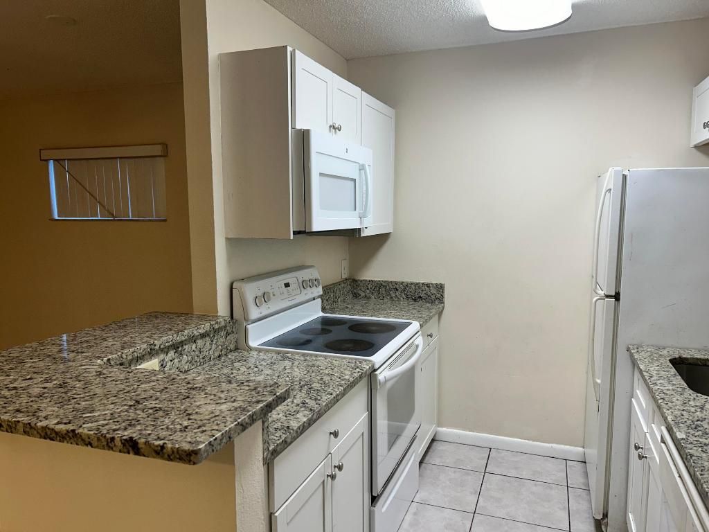 Photo of 23 Crossings Circle #E, Boynton Beach, FL 33435 (MLS # R11134355)