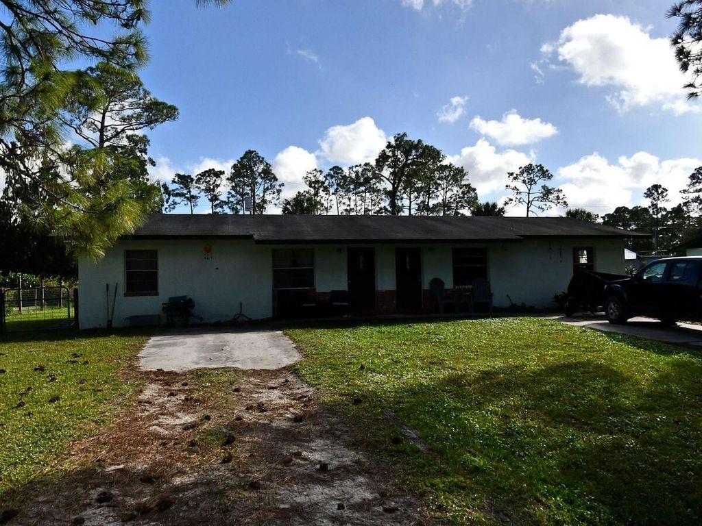 Photo of 140 Laidback Way, Fort Pierce, FL 34945 (MLS # R11026829)