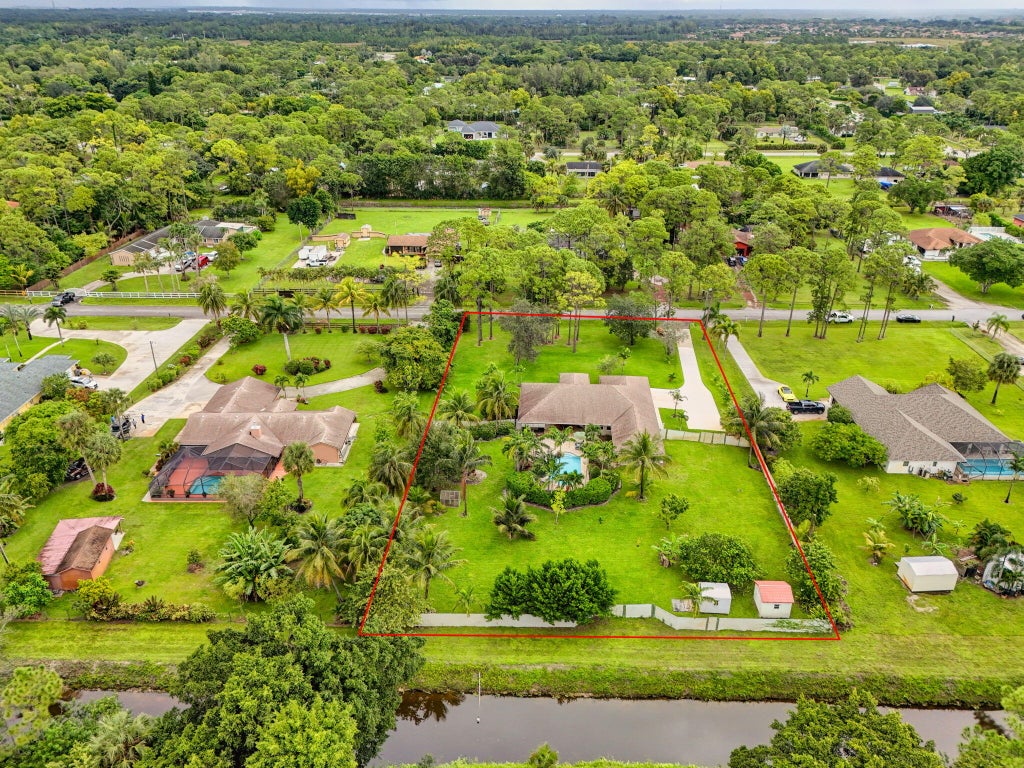 Photo of 11646 63rd Lane N, The Acreage, FL 33412 (MLS # R11131323)