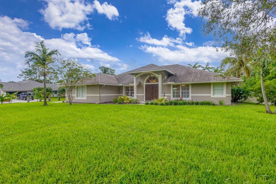 Welcome to your private paradise! This exquisite 4-bedroom, plus den/5th bedroom, single-family home boasts 2,718 sq. ft. of beautifully updated living space on a generous 1.25-acre lot with no HOA restrictions and PAVED road. Perfect for families and entertaining, this move-in-ready residence combines modern upgrades with resort-style outdoor living.Step inside to a bright, open-concept interior featuring a brand-new kitchen with sleek granite countertops and top-of-the-line brand new appliances. The home offers a spacious second master suite and a convenient new laundry room, enhancing functionality and comfort. Dual water heaters and an efficient HVAC system ensure year-round ease.