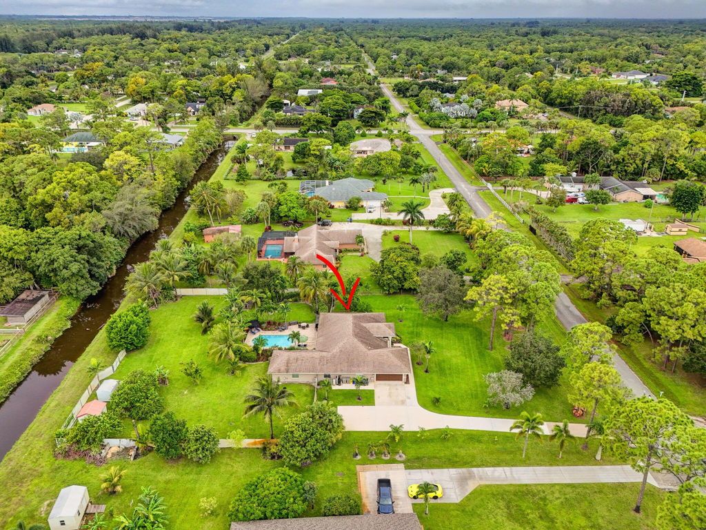 Photo of 11646 63rd Lane N, The Acreage, FL 33412 (MLS # R11131323)