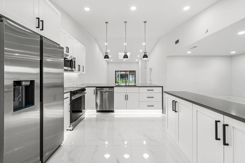 Photo of 6078 Sunny Pointe Circle, Delray Beach, FL 33484 (MLS # R11129581)