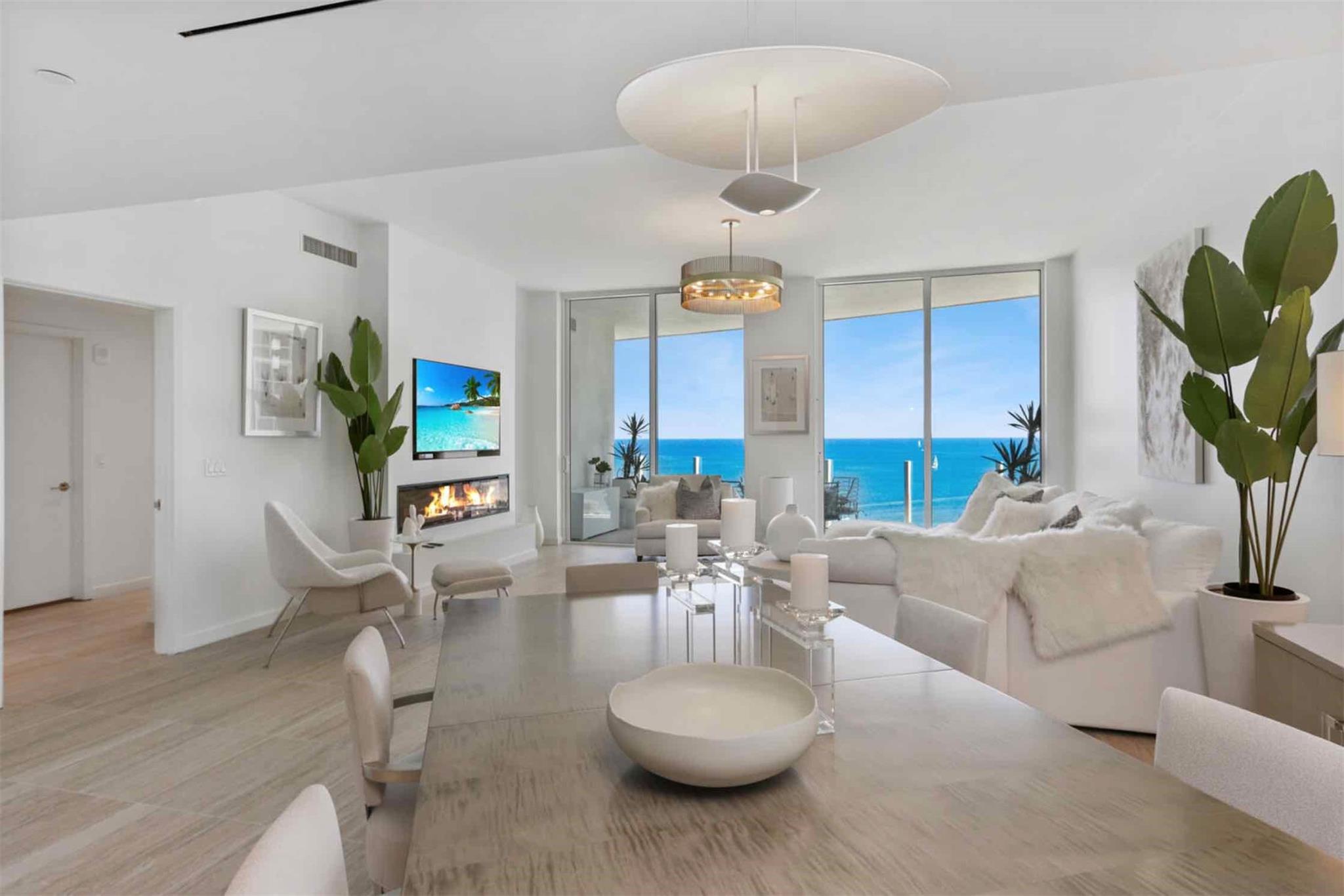 FOUR SEASONS PRIVATE RESIDENCES, Brand New Private residence with 3 bedroom, 3 1/2 bath and a southeastern exposure with direct ocean views. Dramatic floor to ceiling glass and gracious open terraces afford you ample natural light throughout the home. Gourmet kitchen with custom lacquered cabinetry, Dornbracht faucets, Sub Zero, Miele, and Wolf appliances. Dual owners retreat configuration optimizes privacy between you and your guests as well as offering a third full suite and additional half bath. Abundant closet space throughout this luxury residence. Baths are adorned with signature marble, custom oak cabinetry, and brushed nickel Waterworks fittings. The expansive oversized terrace extends the entire width of this luxury residence with access from main living area and each suite.