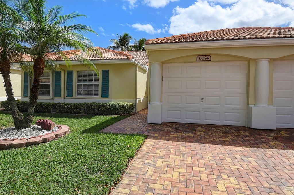Photo of 6074 Lake Hibiscus Drive Dr, Delray Beach, FL 33484 (MLS # R10785581)