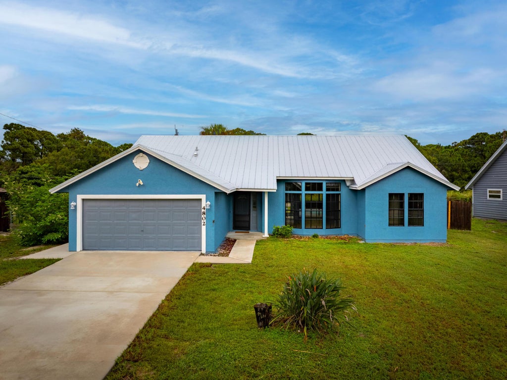 Photo of 4802 Sunset Boulevard, Fort Pierce, FL 34982 (MLS # B26051586)