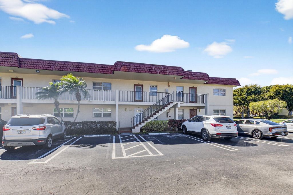 Photo of 33 Abbey Lane #207, Delray Beach, FL 33446 (MLS # R11166806)