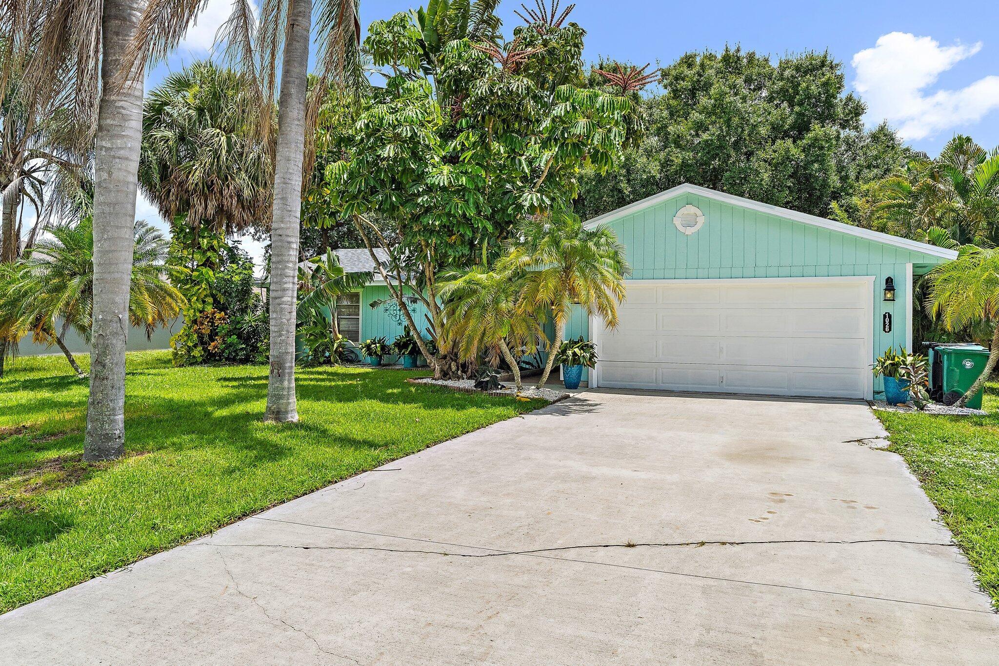 Charming move-in ready home with NEW ROOF (2024), Hot Water Heater (2025), newer AC (2021). Remodeled open kitchen with adjoining dining room for quiet dinners in or easy entertaining. This 3-bedroom, 2-bath home with vaulted ceilings boasts split floor plan for enhanced privacy, a master suite with private bath and walk-in closet. Every bedroom has a walk-in closet! Large 2-car garage has washer-dryer hook-up and new generator transfer switch. Covered patio offers enough space for picnics with family and a dedicated garden area away from larger fenced backyard where kids and pets can play. Freshly painted tropical motif with refreshed landscaping with mature shade and palm trees. Quiet neighborhood with convenient location close to shopping and interstate.