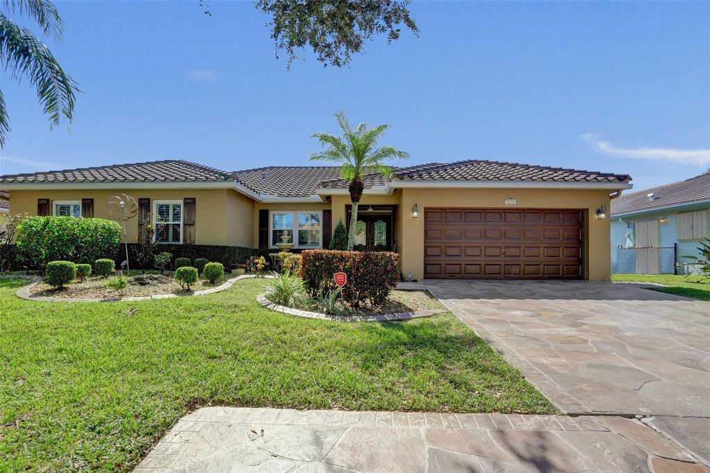 Photo of 4142 NW 58th Drive, Coconut Creek, FL 33073 (MLS # F10531335)