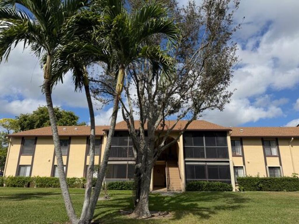 Photo of 810 Sky Pine Way #G2, Greenacres, FL 33415 (MLS # R11158272)