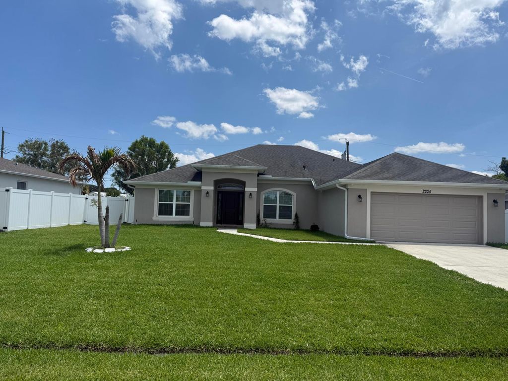Photo of 2225 SE Merrill Road, Port Saint Lucie, FL 34952 (MLS # B26027239)