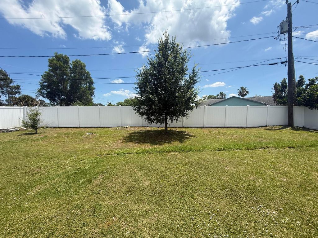 Photo of 2225 SE Merrill Road, Port Saint Lucie, FL 34952 (MLS # B26027239)