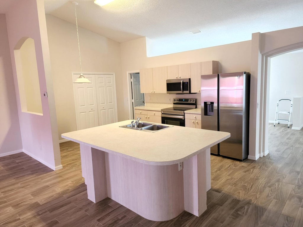 Photo of 2709 SW Somber Road, Port Saint Lucie, FL 34953 (MLS # B26048079)