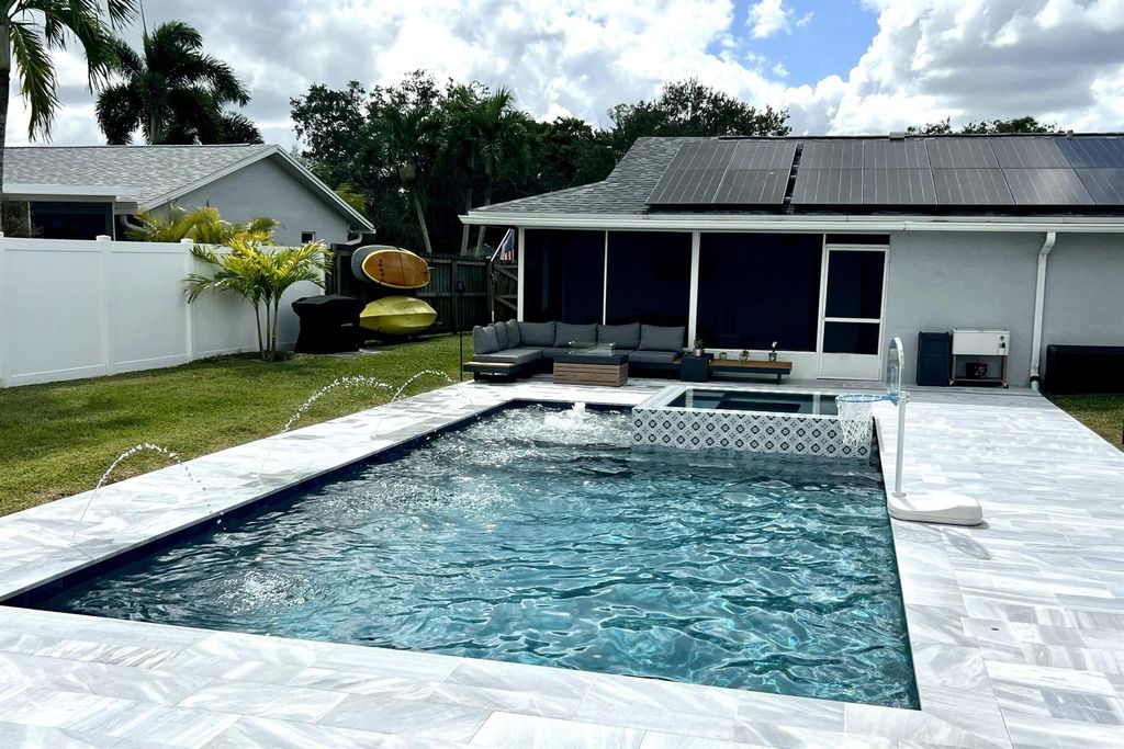 Photo of 351 La Mancha Avenue, Royal Palm Beach, FL 33411 (MLS # R11135187)