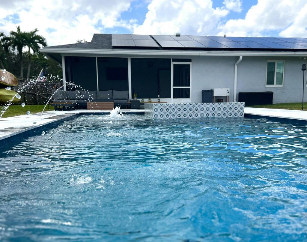Photo of 351 La Mancha Avenue, Royal Palm Beach, FL 33411 (MLS # R11135187)